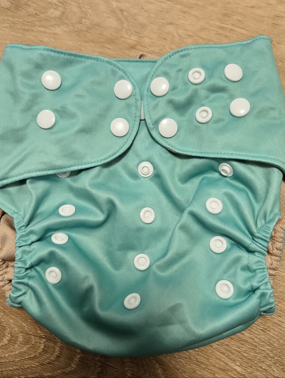 Dino diapers one size pocket diaper seafoam green color